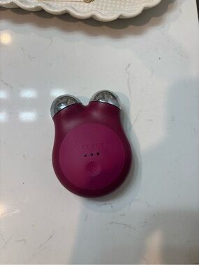 NuFACE Mini Facial Toning Device in Deep Plum with Silver Spheres